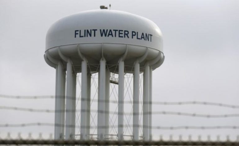 Six Michigan officials charged with manslaughter in Flint water crisis