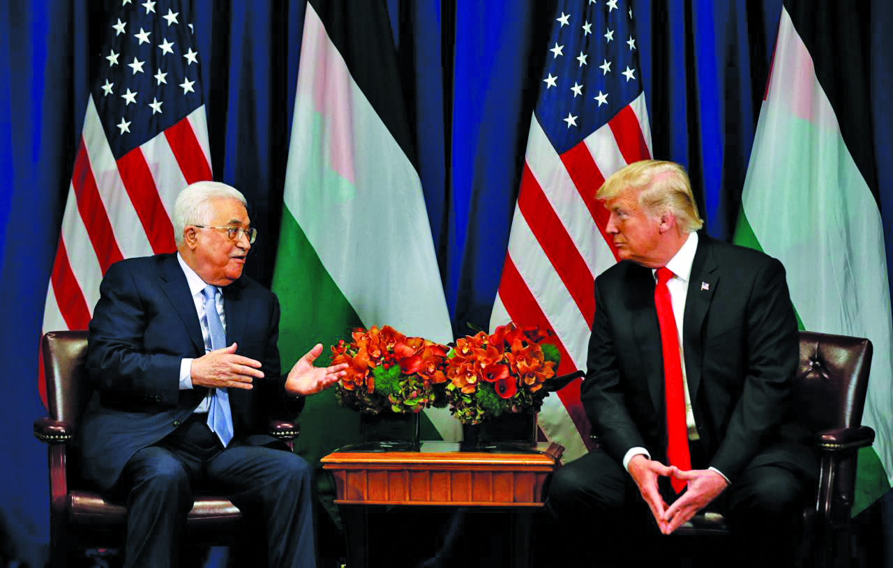Former U.S President Donald Trump meets with Palestinian Authority leader Mahmoud Abbas at the U.N. General Assembly in New York, Sept. 20, 2018. Photo: Reuters