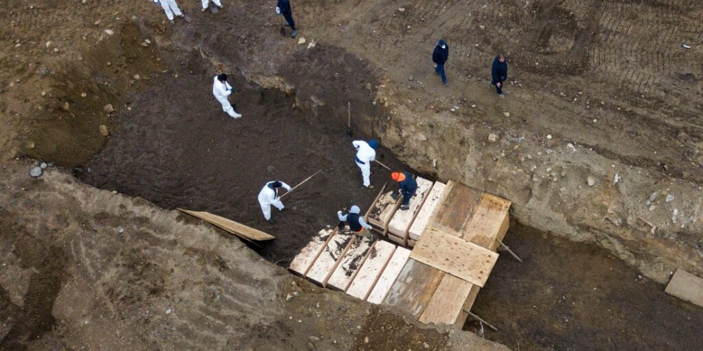 Drone pictures show bodies being buried on Hart Island in New York City, April 9. Photo: Lucas Jackson/Reuters