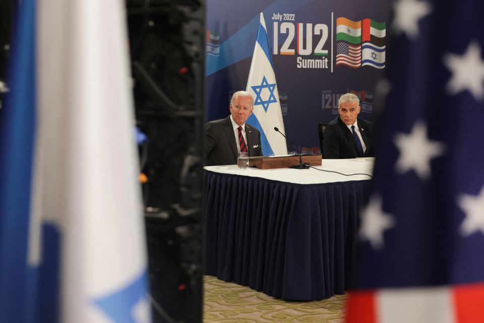 President Biden and Israeli Prime Minister Yair Lapid attend the first virtual meeting of the "I2U2" group with leaders of India and the United Arab Emirates, in Jerusalem, July 14. Photo: Evelyn Hockstein/Reuters 