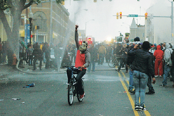 Marchers protest police violence in Baltimore, New York