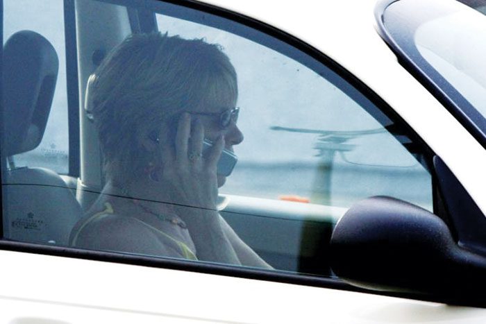 Mobile device makers seek avenues to disable phones while driving
