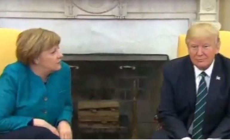 Trump refuses to shake Angela Merkel’s hand