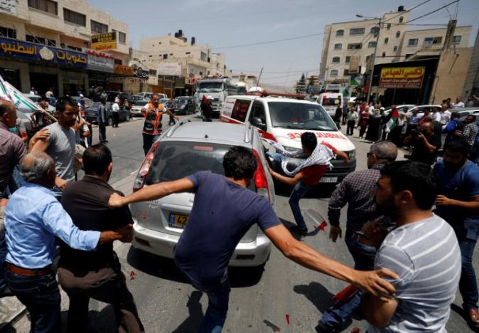 Palestinian killed as settler opens fire during peaceful protest