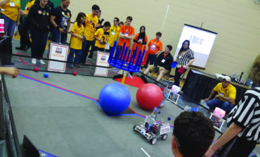 Unis Middle School hosts FIRST tech challenge