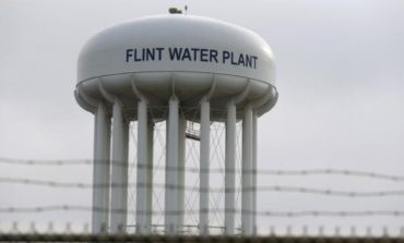 Michigan to charge state's top medical official in Flint water deaths