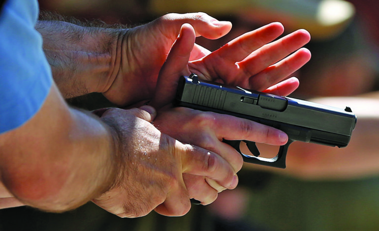 Poll: Americans want armed school guards and tighter gun laws