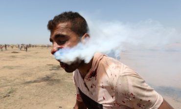 Palestinian hit in face by tear gas canister fired by Israeli soldier in Gaza protests