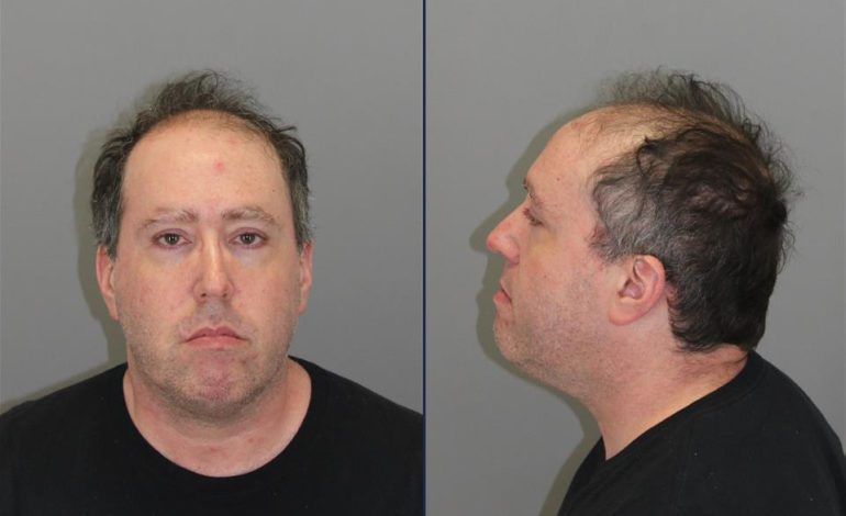 Man arrested for scamming travelers at several airports including Detroit Metro Airport