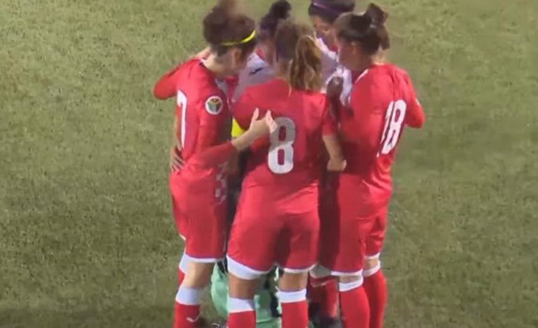 Jordanian soccer team huddles around opposing player during game so she can fix her hijab
