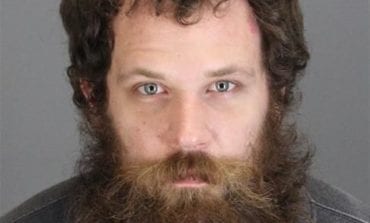 Garden City man charged in carjacking of police vehicle