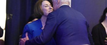 U.S, Sen. Amy Klobuchar (D-MN) greets former Vice President Joe Biden at a South Carolina Democratic Party dinner on February 24. Klobuchar’s campaign announced Monday that she will be dropping out of the race and endorsing Biden in Dallas, Texas. Photo: Meg Kinnard/AP