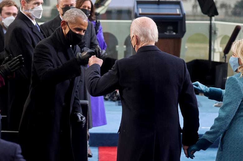 President Biden fist-bumps former President Barack Obama on Inauguration Day, Jan. 20