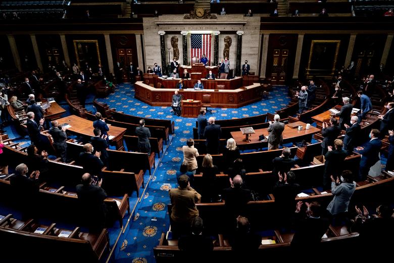The House chamber reconvenes and condemns the violent riot led by pro-Trump supporters inside the Capitol Building. Photo: Reuters