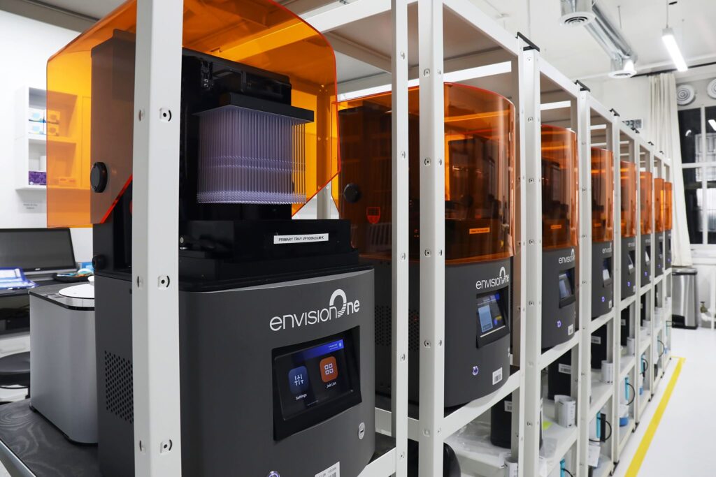 EnvisionTec 3D printers being used to fabricate over one million COVID-19 testing swabs. Image via PostProcess