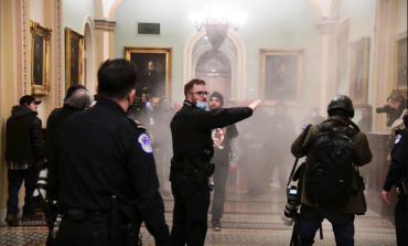 Guns and tear gas in U.S. Capitol as Trump supporters attempt to overturn his loss