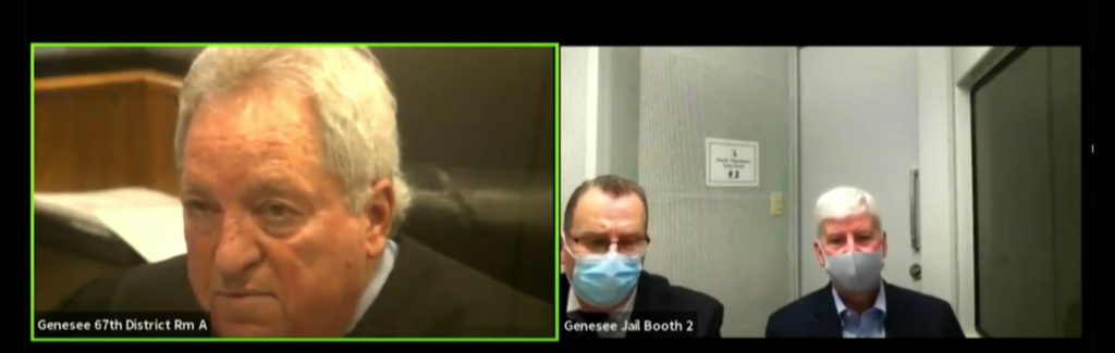 Snyder makes a remote court appearance from a Genesee County jail booth, Thursday, Jan. 14. Screengrab.
