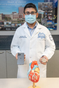 Dr. Singh testing an iPhone against a defibrillator. Photo: Henry Ford Health Systems