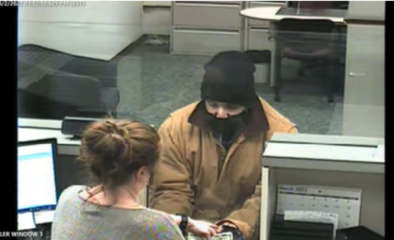 Dearborn bank robbery suspect caught hiding in porta-potty