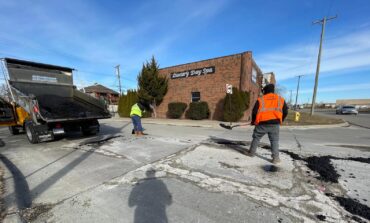 Who pays for road repairs on Dearborn city-maintained roads?