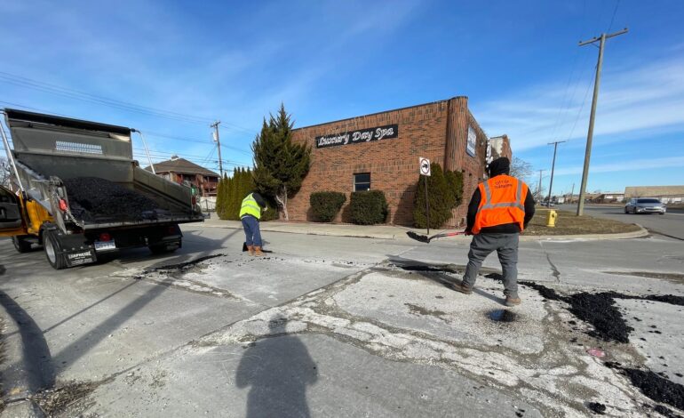 Who pays for road repairs on Dearborn city-maintained roads?