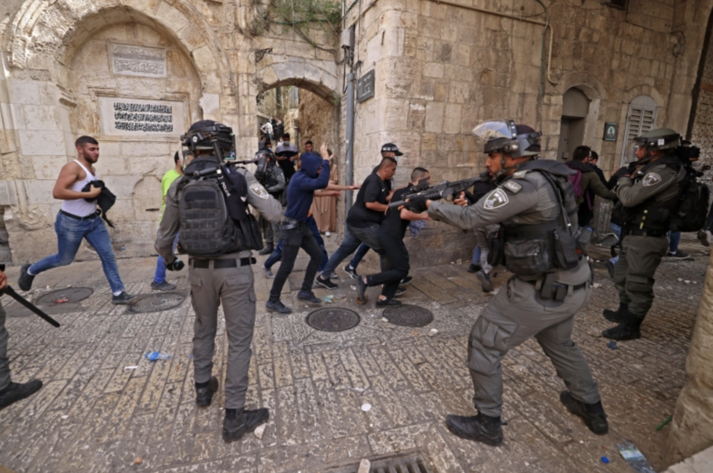 Palestinian protesters run from Israeli security forces amid clashes in Jerusalem's Old City [Emmanuel Dunand/AFP] Published On May 10, 2021
