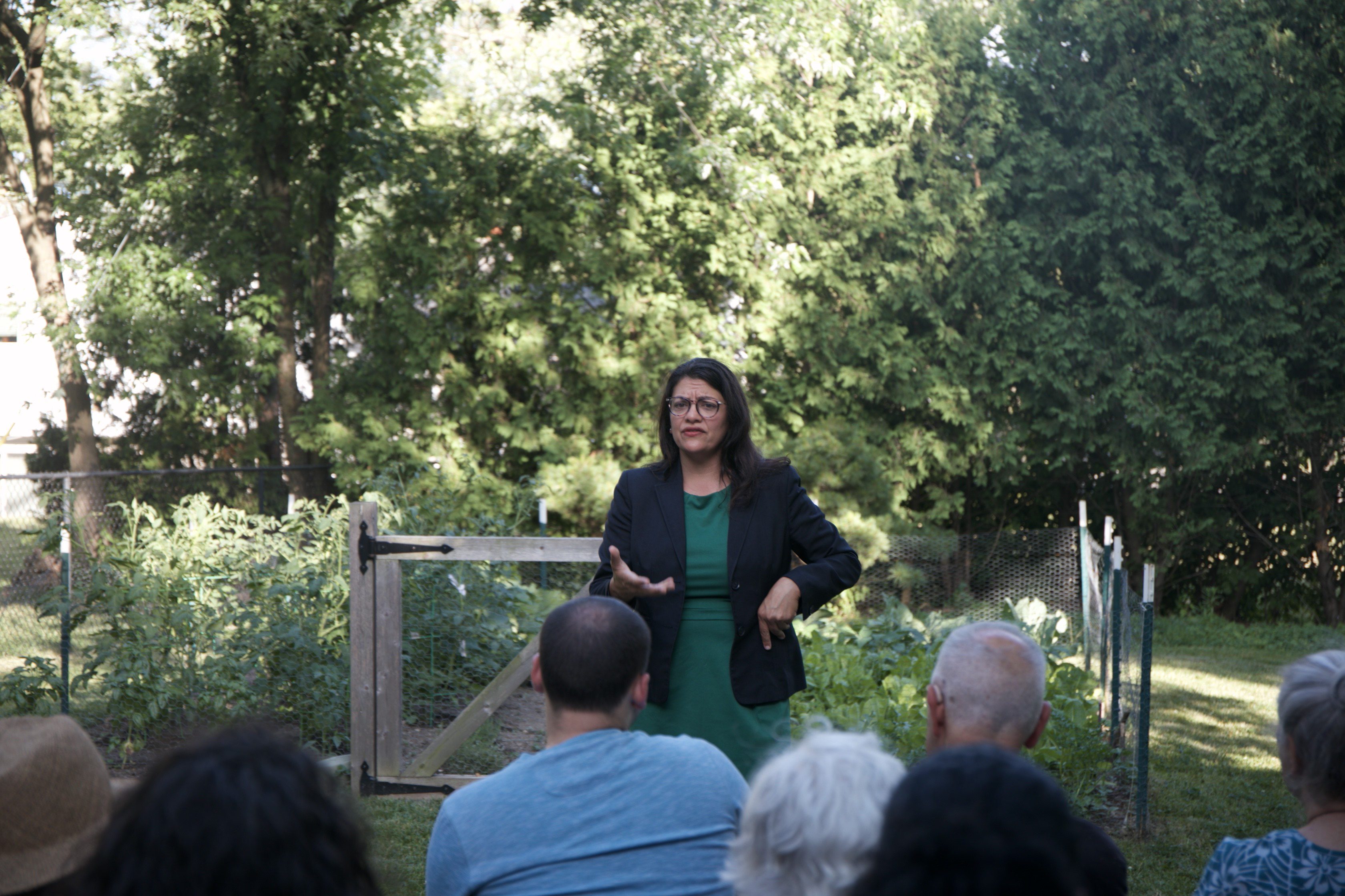 U.S. Rep. Rashida Tlaib (D-Detroit) speaks to residents at a campaign event.